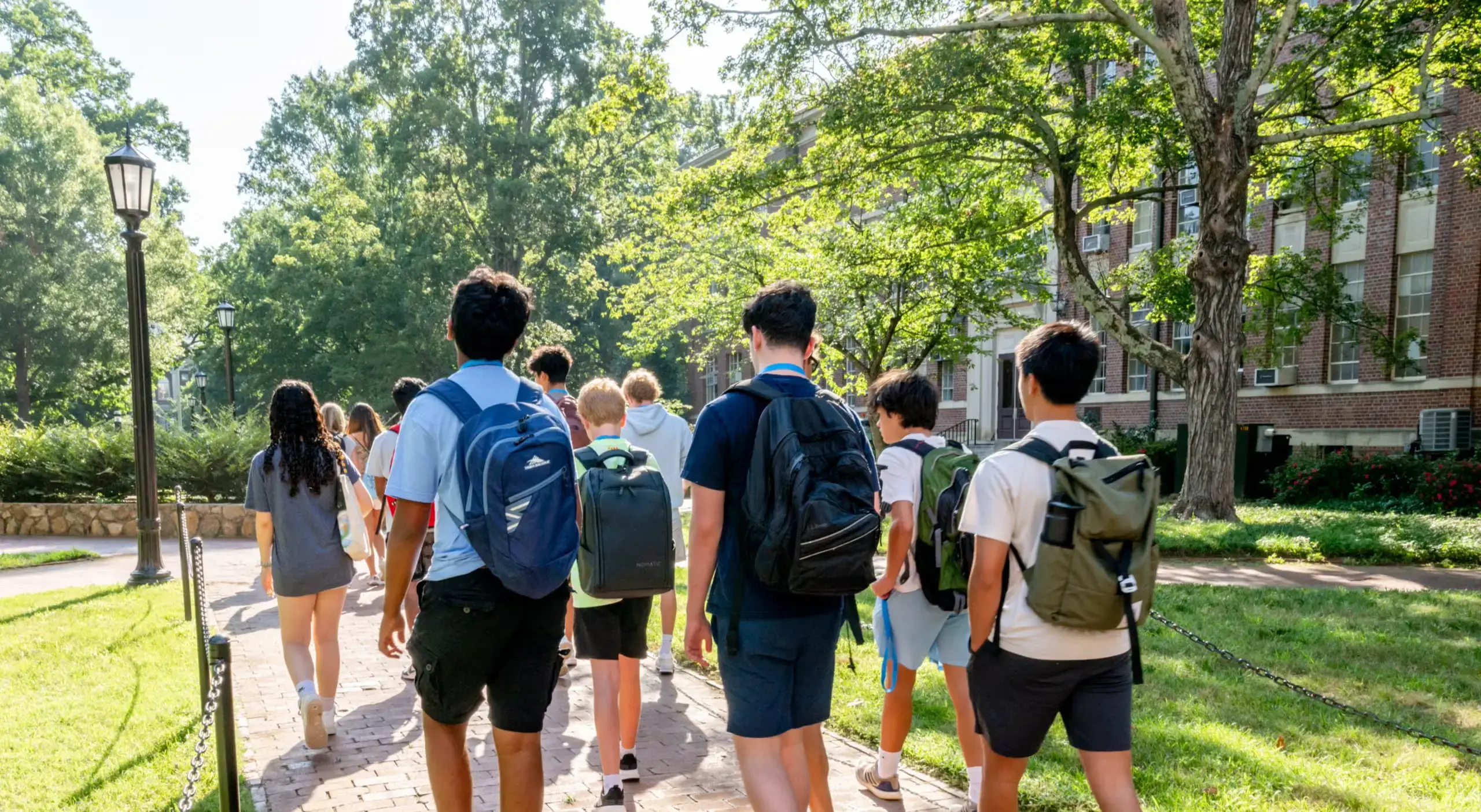 Group of students walking through campus